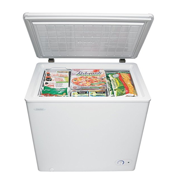 a white freezer with a lid open