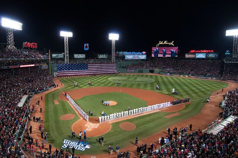 a baseball game with a crowd of people