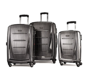 a group of luggage on wheels