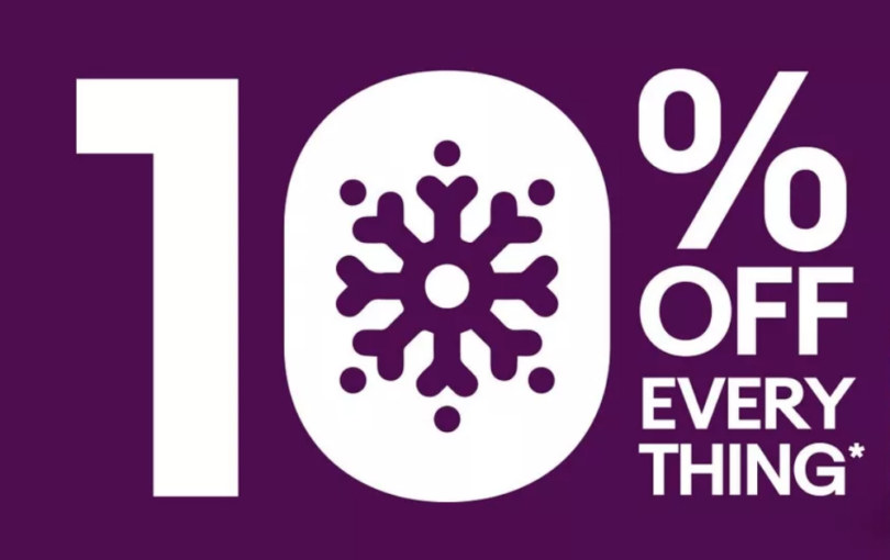 a purple sign with a snowflake and text