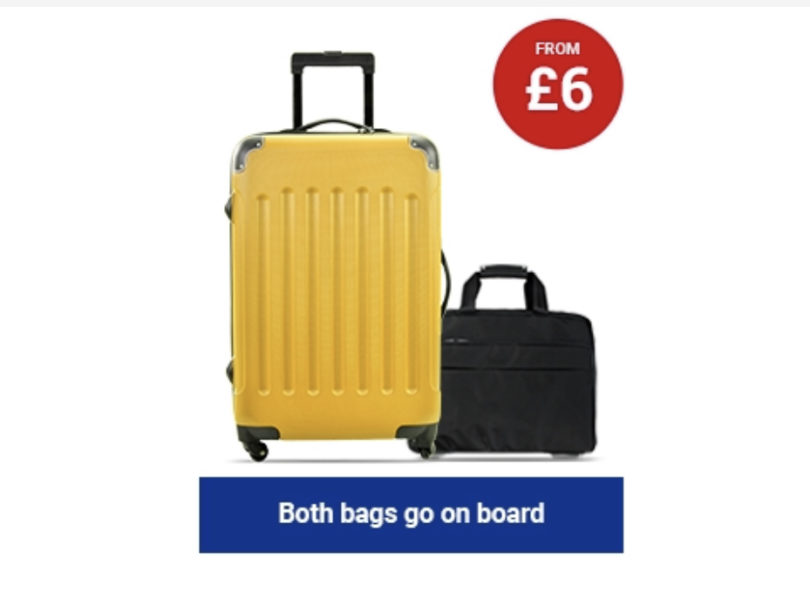 a yellow suitcase with wheels and handle
