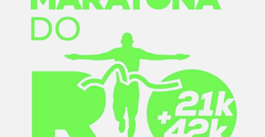 a green logo with a person running