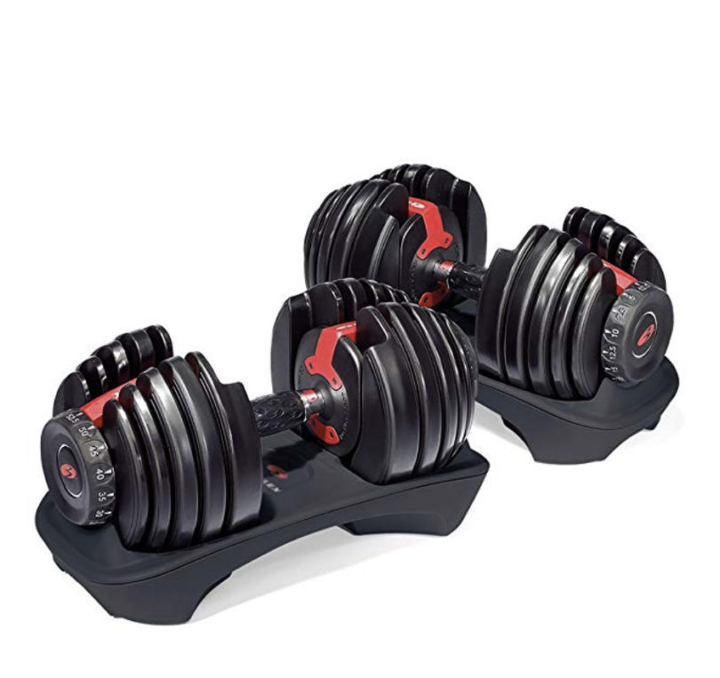 a group of weights on a stand