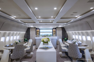 a white table with chairs and a bar in a plane