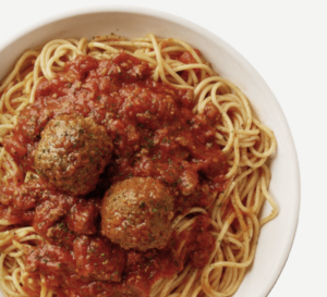 a bowl of spaghetti with meatballs and sauce