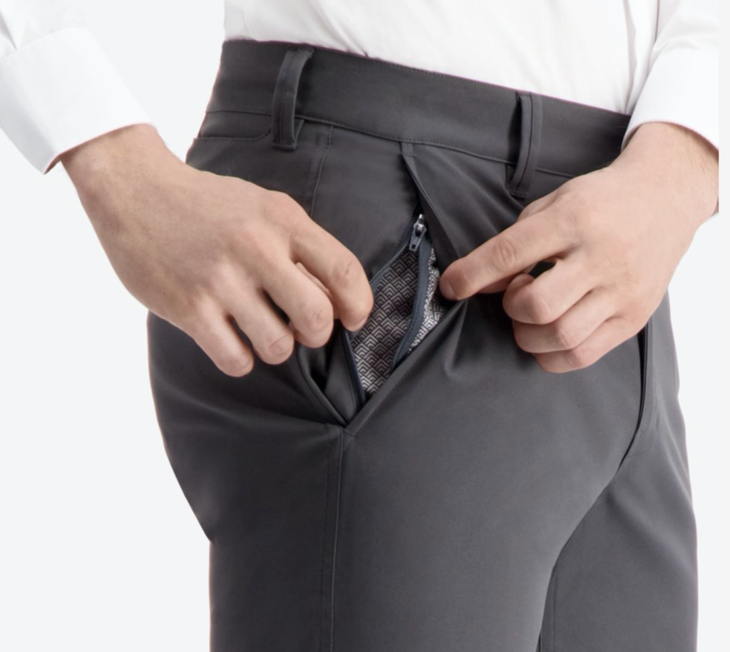 a person putting their pants in a pocket