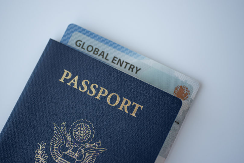 a passport and a global entry card