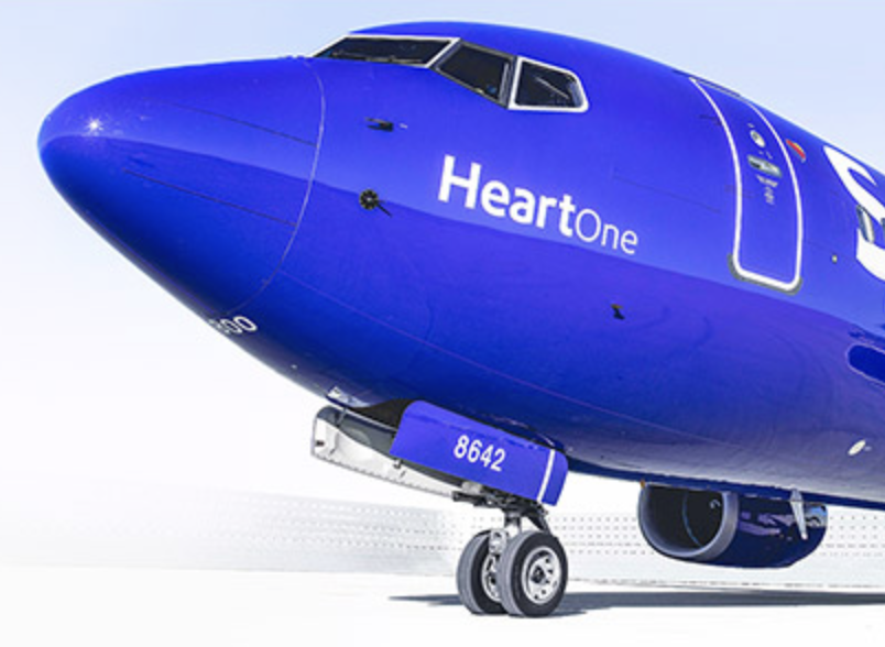 the front of a blue airplane