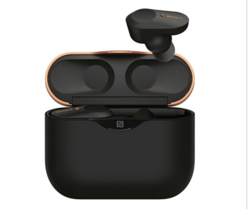a black and gold wireless earbuds
