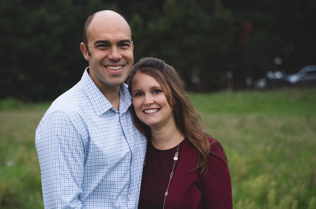 a man and woman posing for a picture