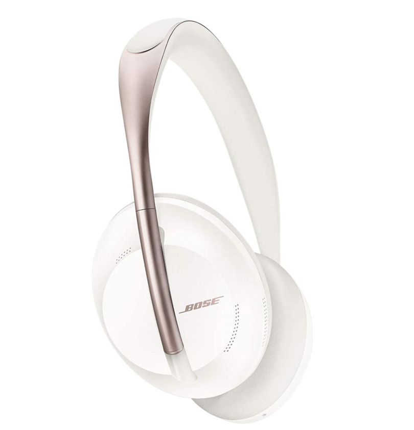 a white headphones with a silver handle