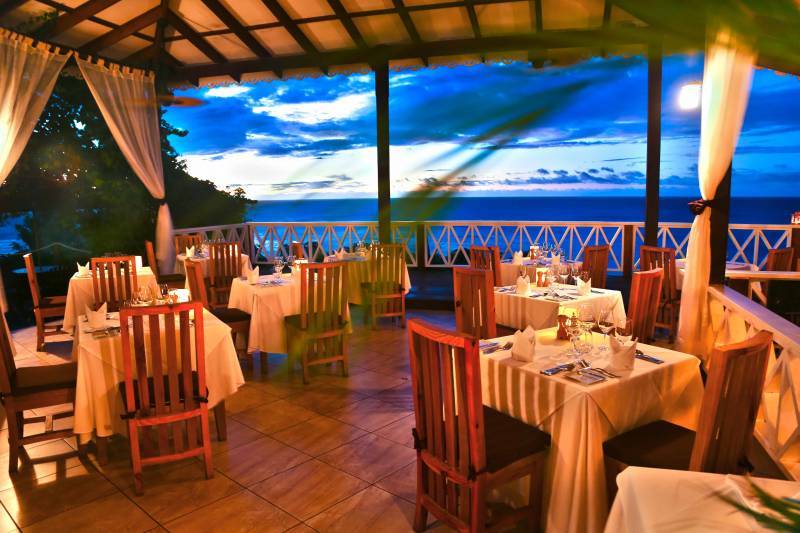 a restaurant with tables and chairs