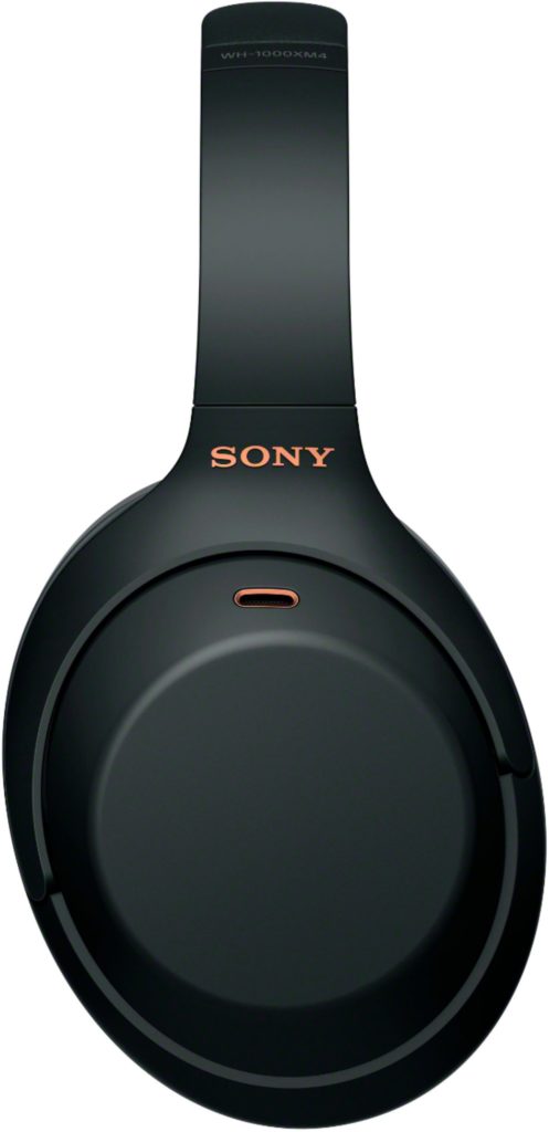 a black headphones with orange lettering