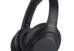 a black headphones with gold text