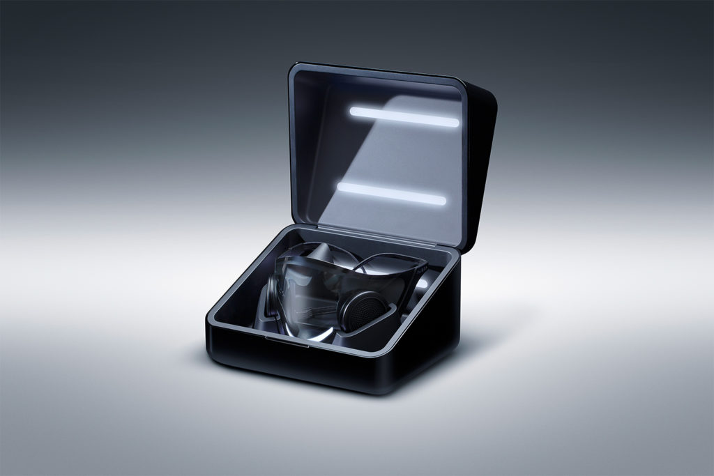 a black case with glasses and headphones inside