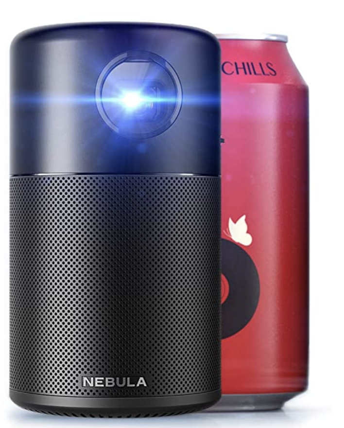 a black speaker next to a red can