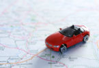 a toy car on a map
