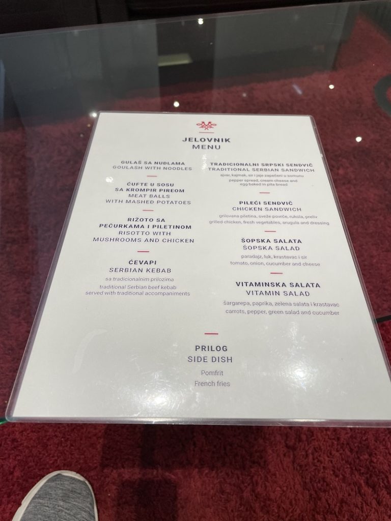 a menu on a glass table