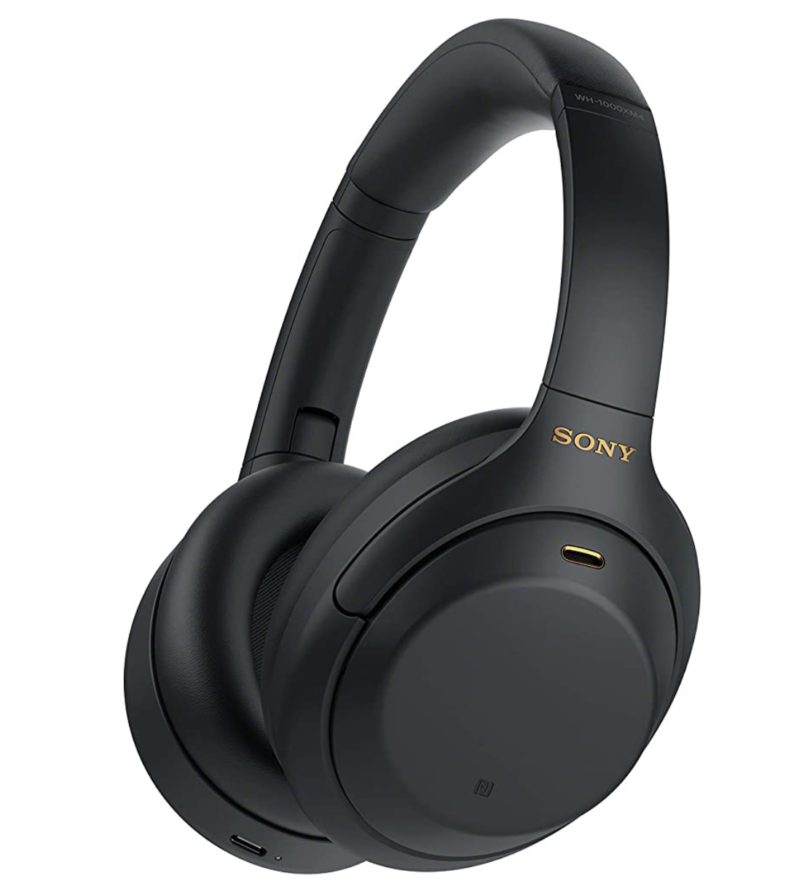 a black headphones with gold text