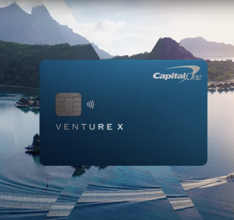 a credit card with mountains in the background