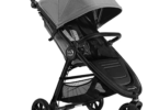 a stroller with a grey cover
