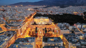 a city with many buildings and trees
