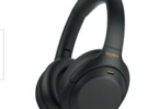a black headphones with yellow text