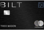 a black credit card with silver and black text
