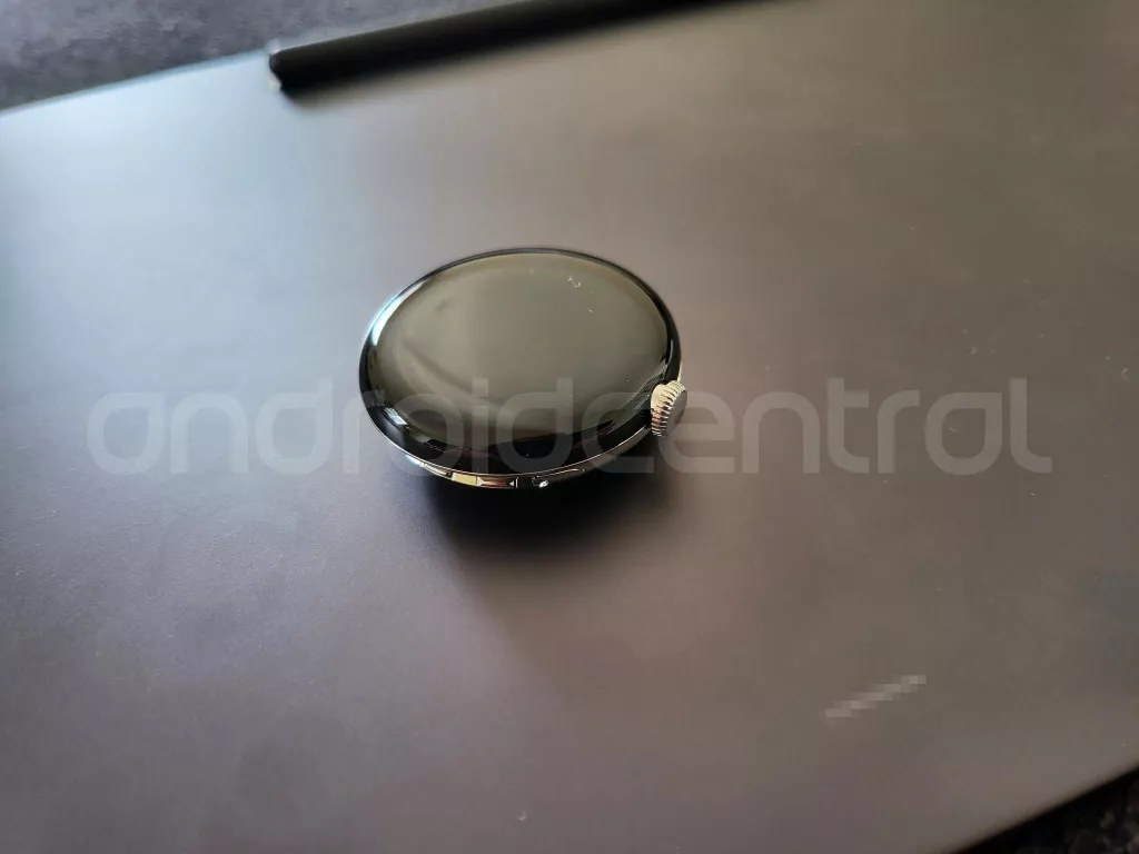 a black round object on a black surface