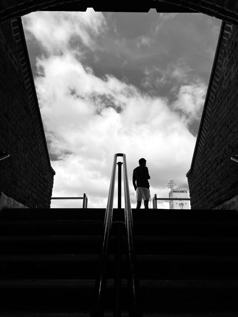 a man walking up stairs