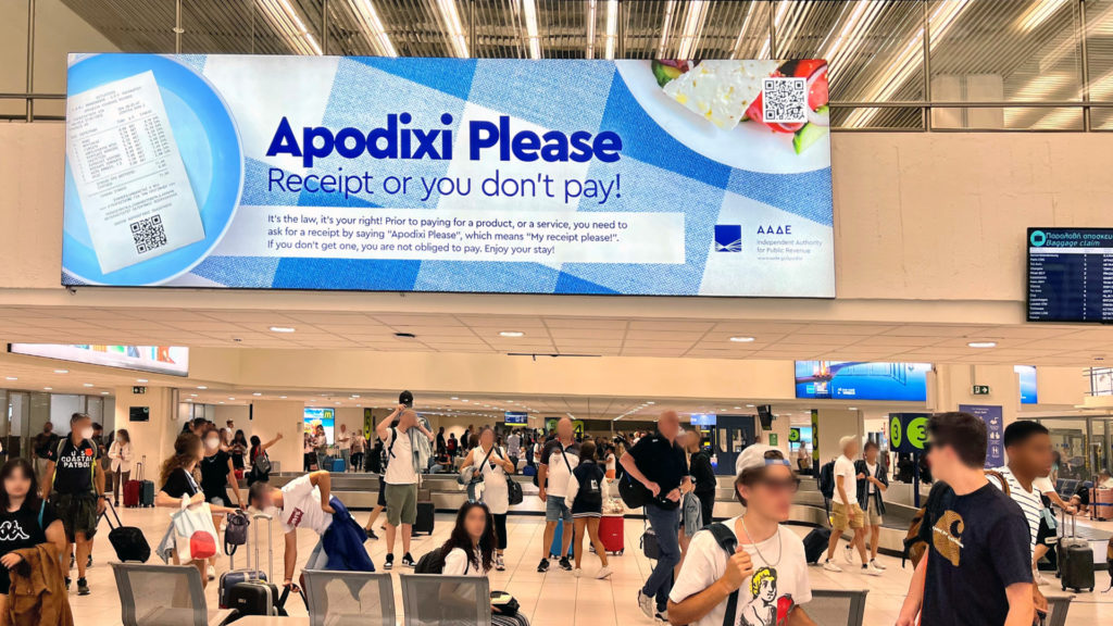 a large sign in an airport