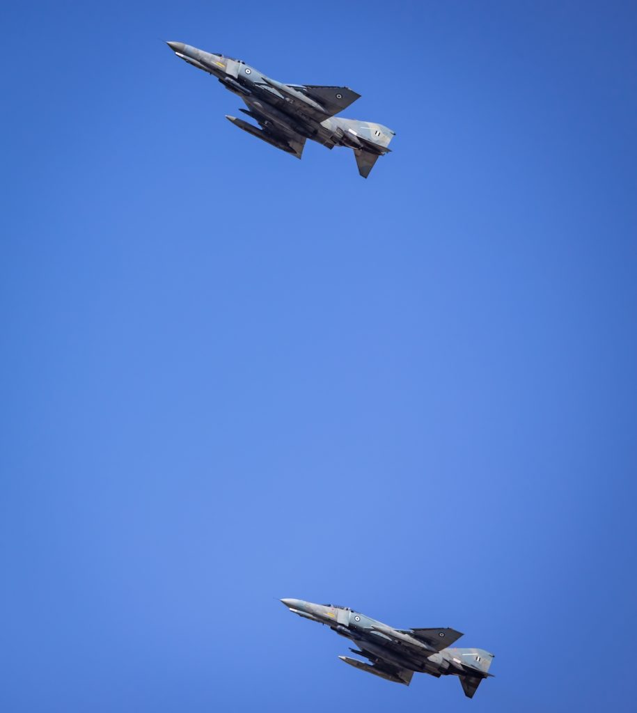 two planes flying in the sky