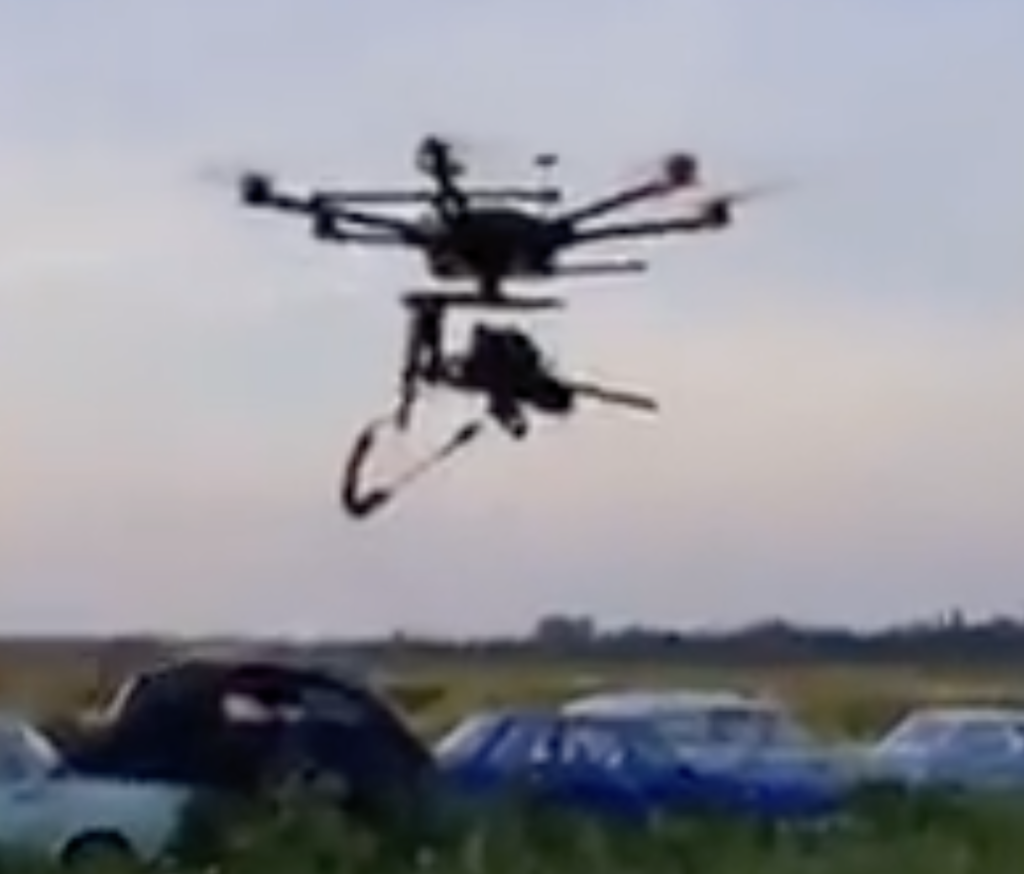 Wow! Here is a Video of a DJI Drone Equipped with a Machine Gun ...