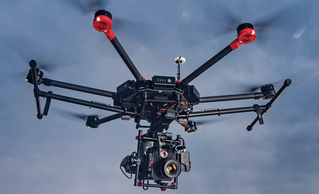 a drone with camera and a camera