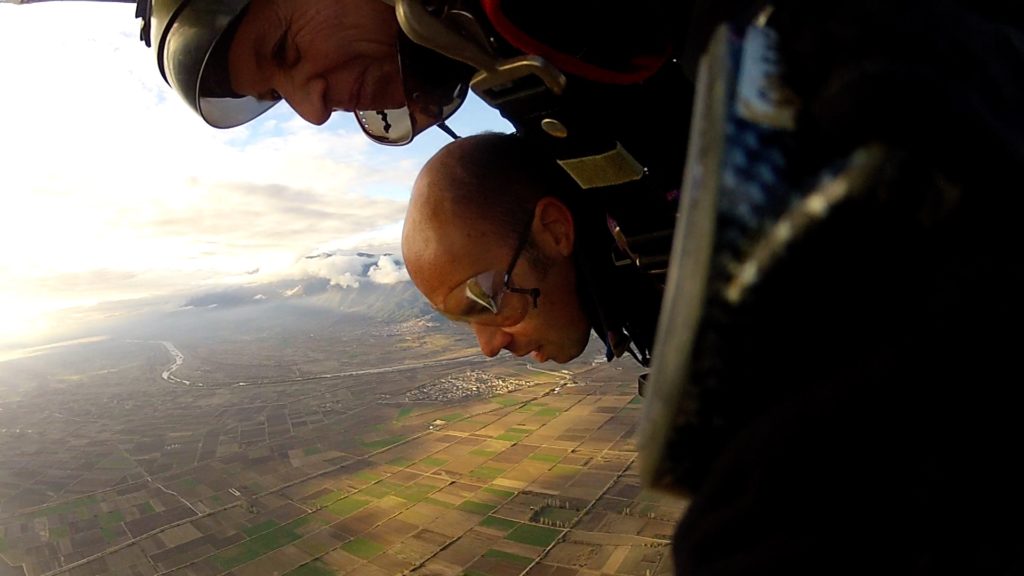 two men skydiving in the sky