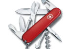 a red swiss army knife with many different tools