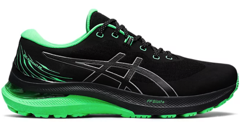 a black and green running shoe