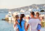 a group of people standing on a dock