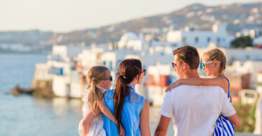 a group of people standing on a dock