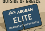 The image features a cracked card on a cracked surface, symbolizing a broken program. The card reads "AEGEAN ELITE FOR ELITES OUTSIDE OF GREECE" with the Aegean Airlines logo. Above the card, text says "AEGEAN AIRLINES RUINS ELITE PROGRAM FOR ELITES OUTSIDE OF GREECE." The overall theme suggests dissatisfaction with changes to an elite program.