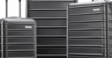 a group of black luggage