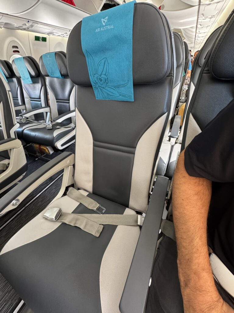 a seat with a blue cloth on it