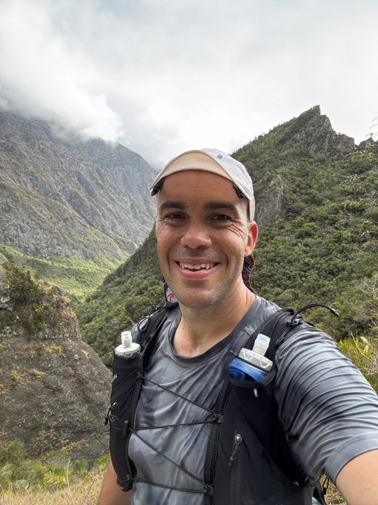 a man taking a selfie in a mountain
